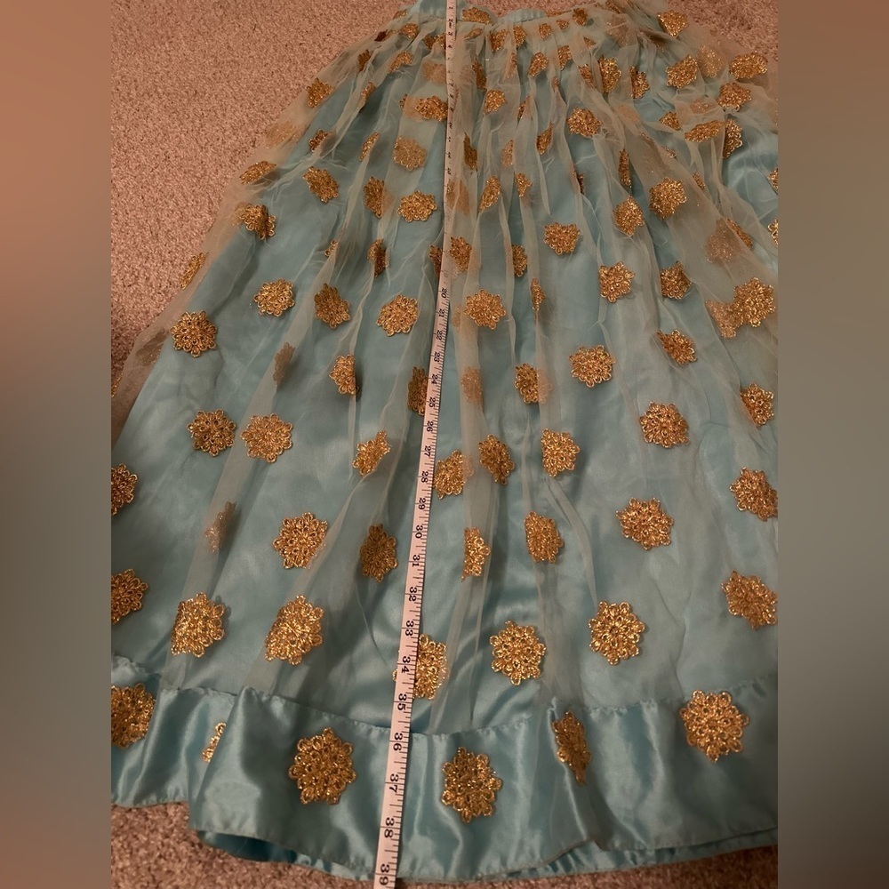 Aqua blue lehenga with sawl  (blouse not included)